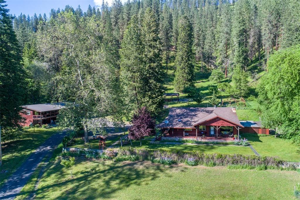 red-cabin-surrounded-by-pine-trees.jpg