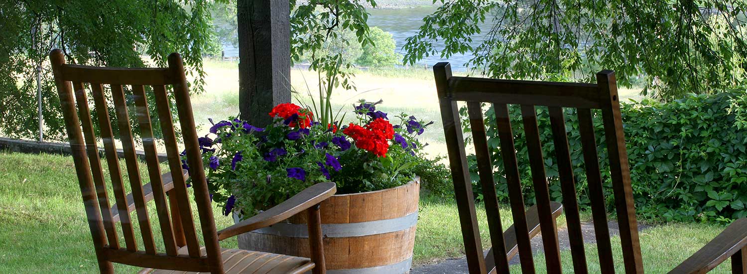 two-rustic-rocking-chairs-on-porch.jpg